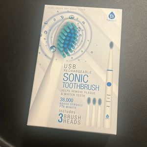 USB rechargeable sonic toothbrush Includes 3 brush heads
